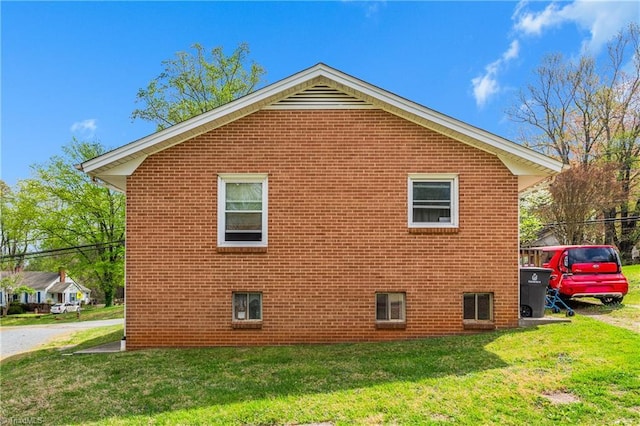 4478 Ogburn Ave, Winston-Salem, NC 27105 - view of property exterior featuring brick siding and a lawn