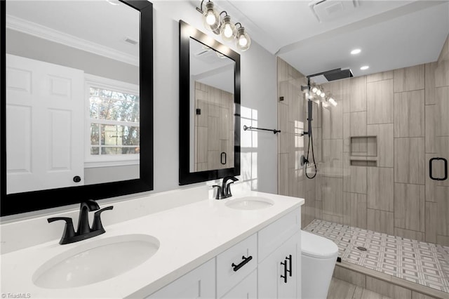 bathroom featuring walk in shower, vanity, toilet, and crown molding