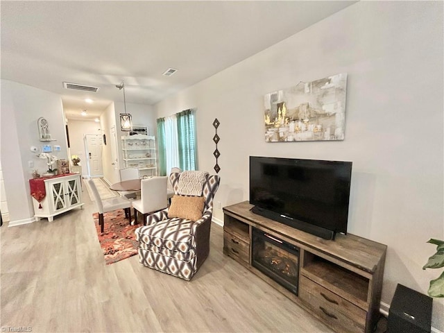 living room with light wood-type flooring