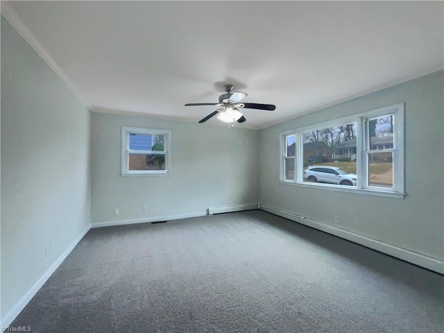 empty room featuring baseboards, a healthy amount of sunlight, and carpet flooring