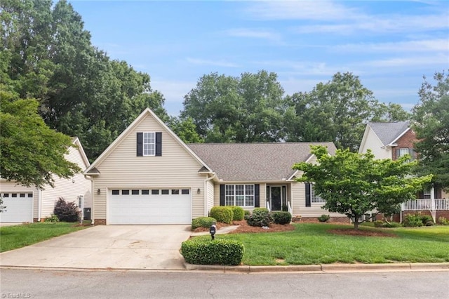 145 Millers Crossing Ct, Winston-Salem, NC 27103 - view of front of home with concrete driveway and a front lawn