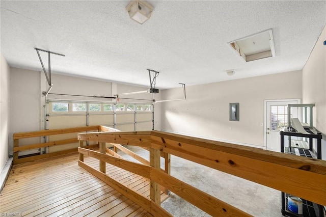 145 Millers Crossing Ct, Winston-Salem, NC 27103 - garage featuring electric panel and a garage door opener