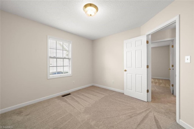 145 Millers Crossing Ct, Winston-Salem, NC 27103 - unfurnished bedroom with carpet and a textured ceiling