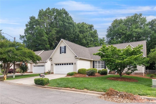 145 Millers Crossing Ct, Winston-Salem, NC 27103 - view of front facade featuring driveway, a front lawn, and roof with shingles