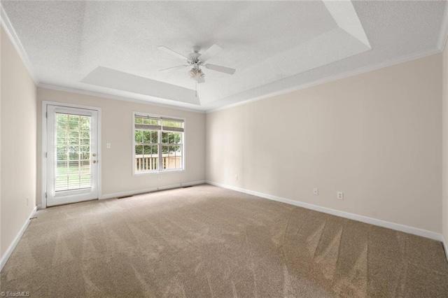 145 Millers Crossing Ct, Winston-Salem, NC 27103 - carpeted empty room with a raised ceiling, a ceiling fan, a textured ceiling, and crown molding