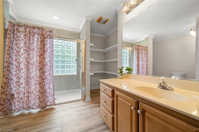 145 Millers Crossing Ct, Winston-Salem, NC 27103 - full bathroom with ornamental molding, wood finished floors, vanity, and a shower with curtain
