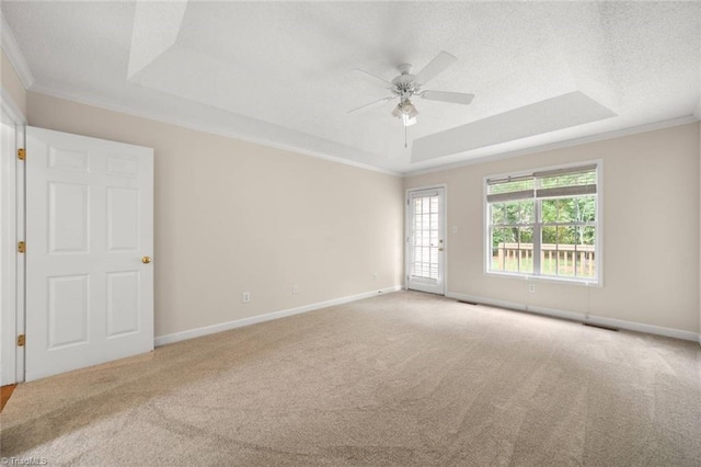 145 Millers Crossing Ct, Winston-Salem, NC 27103 - carpeted empty room with a raised ceiling, ceiling fan, crown molding, and a textured ceiling
