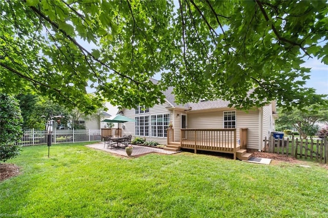 145 Millers Crossing Ct, Winston-Salem, NC 27103 - rear view of property with a fenced backyard, a patio area, and a wooden deck