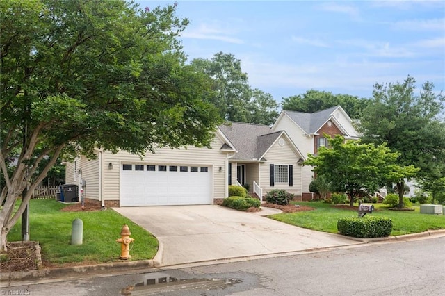 145 Millers Crossing Ct, Winston-Salem, NC 27103 - view of property hidden behind natural elements with a front lawn, an attached garage, and concrete driveway