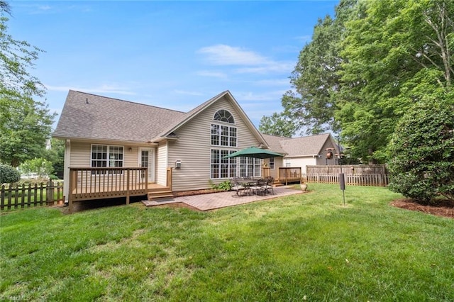 145 Millers Crossing Ct, Winston-Salem, NC 27103 - back of property featuring a fenced backyard, a deck, a patio, and a shingled roof