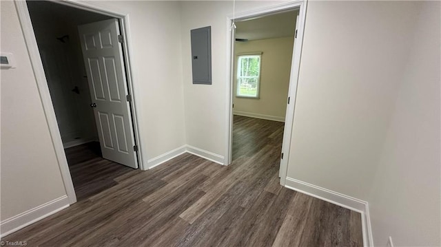 1004 Tabor St, High Point, NC 27262 - hallway with electric panel, dark wood finished floors, and baseboards