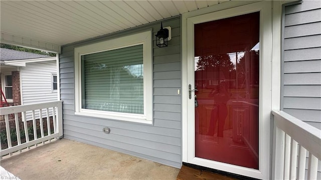 1004 Tabor St, High Point, NC 27262 - view of exterior entry featuring a porch