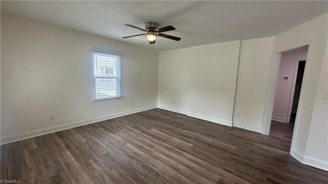 1004 Tabor St, High Point, NC 27262 - unfurnished room featuring ceiling fan, dark wood-type flooring, and baseboards