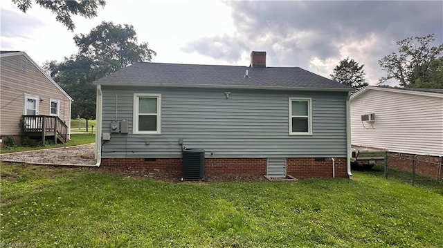 1004 Tabor St, High Point, NC 27262 - back of property with crawl space, central air condition unit, and a chimney