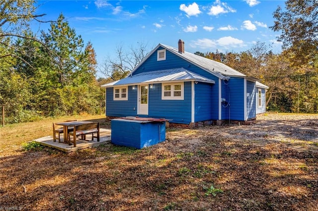 rear view of property with a patio