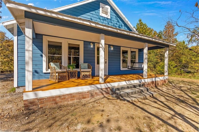 view of front of home featuring covered porch