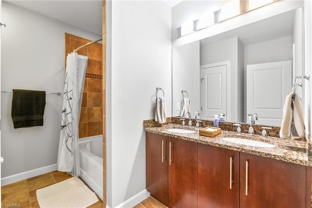 bathroom featuring vanity and shower / tub combo