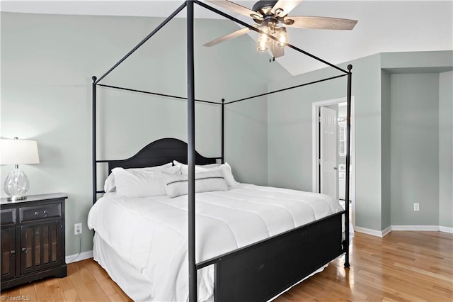 bedroom with light hardwood / wood-style flooring and ceiling fan