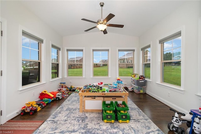 6006 Tanoak Ct, Stokesdale, NC 27357 - game room with vaulted ceiling, dark wood finished floors, ceiling fan, and baseboards