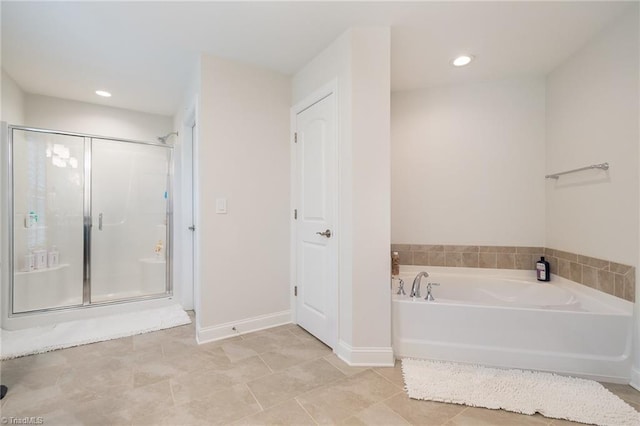 6006 Tanoak Ct, Stokesdale, NC 27357 - full bath featuring a bath, a shower stall, baseboards, recessed lighting, and tile patterned flooring