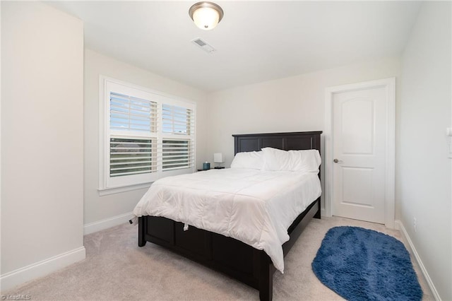 6006 Tanoak Ct, Stokesdale, NC 27357 - bedroom with baseboards and light carpet
