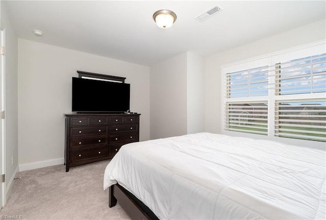 6006 Tanoak Ct, Stokesdale, NC 27357 - bedroom featuring light carpet and baseboards