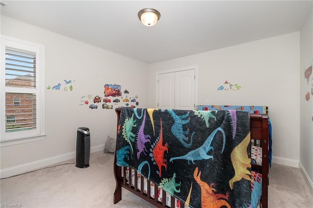 6006 Tanoak Ct, Stokesdale, NC 27357 - carpeted bedroom with baseboards and a closet