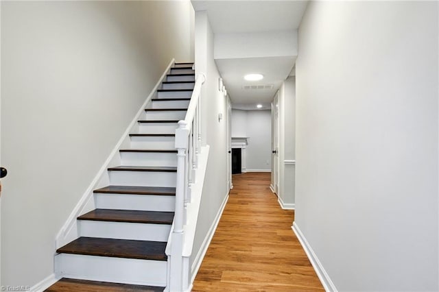 3985 Valley Ct Unit B, Winston-Salem, NC 27106 - stairway with wood finished floors and baseboards