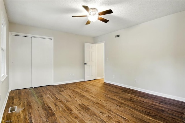 3985 Valley Ct Unit B, Winston-Salem, NC 27106 - unfurnished bedroom with wood finished floors, baseboards, a closet, and a ceiling fan