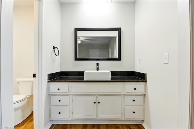 3985 Valley Ct Unit B, Winston-Salem, NC 27106 - bathroom with vanity, toilet, wood finished floors, and baseboards