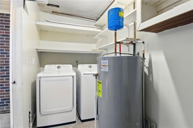 3985 Valley Ct Unit B, Winston-Salem, NC 27106 - laundry area featuring washer and dryer, brick wall, and water heater