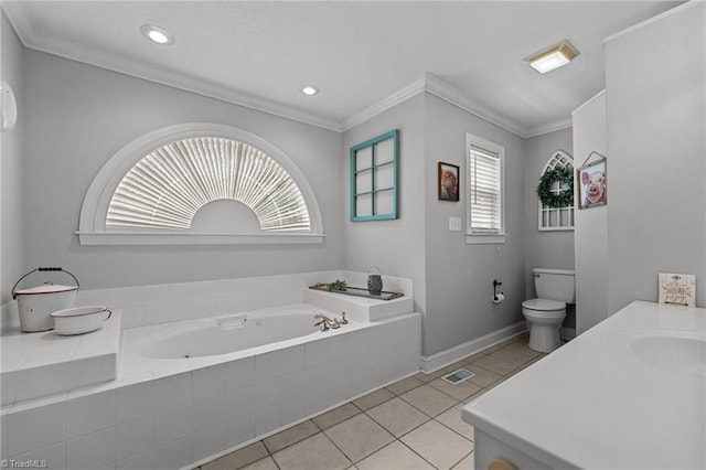 full bath featuring tile patterned floors, a garden tub, ornamental molding, toilet, and recessed lighting