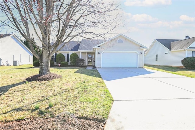 ranch-style house with an attached garage, concrete driveway, and a front lawn