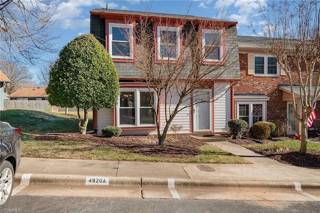 view of front of home with a front lawn