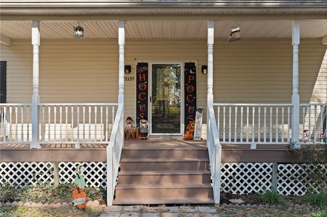 property entrance featuring covered porch