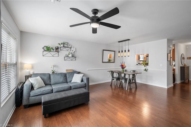 3719 Spanish Peak Dr, High Point, NC 27265 - living room featuring wood finished floors, ceiling fan, and baseboards