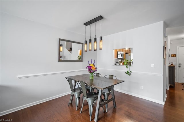 3719 Spanish Peak Dr, High Point, NC 27265 - dining room featuring wood finished floors and baseboards