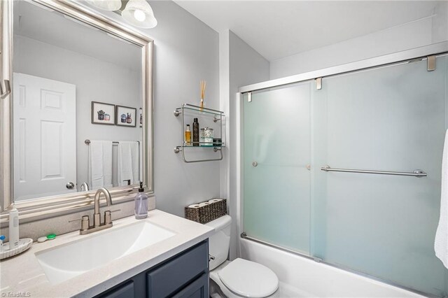 3719 Spanish Peak Dr, High Point, NC 27265 - full bathroom featuring vanity, toilet, and combined bath / shower with glass door