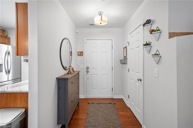 3719 Spanish Peak Dr, High Point, NC 27265 - doorway to outside with dark wood-style floors and baseboards