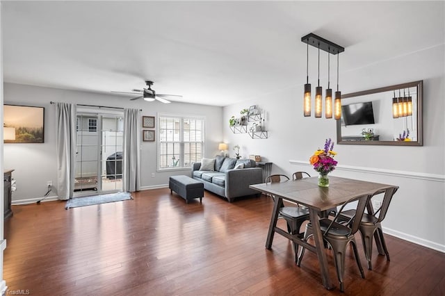 3719 Spanish Peak Dr, High Point, NC 27265 - dining area with ceiling fan, dark wood-type flooring, and baseboards