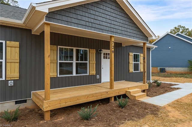 view of front of home featuring central AC and covered porch