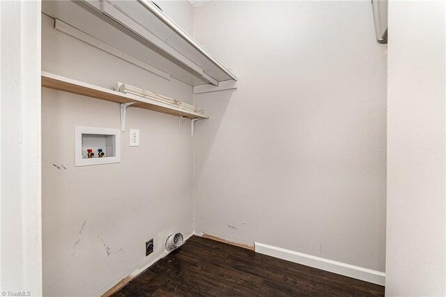 washroom featuring hookup for a washing machine, dark wood-type flooring, and baseboards