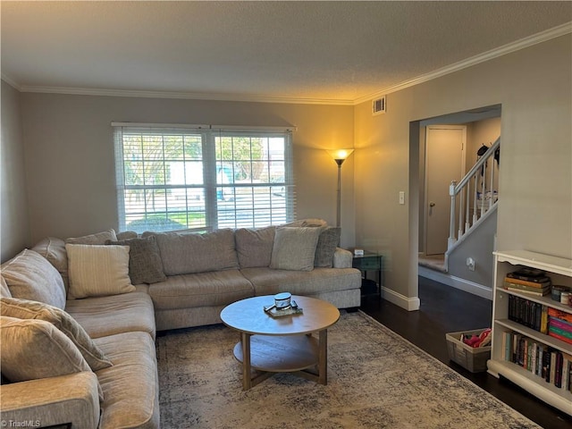 living room featuring ornamental molding, dark wood-type flooring, stairway, and baseboards
