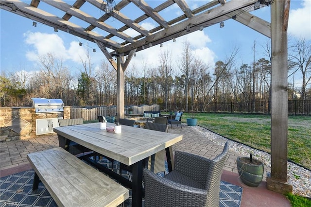 view of patio / terrace with a grill, a pergola, an outdoor hangout area, and an outdoor kitchen