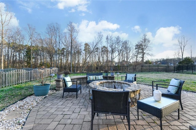 view of patio / terrace with a fire pit