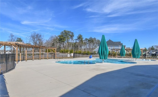 view of swimming pool with a pergola and a patio