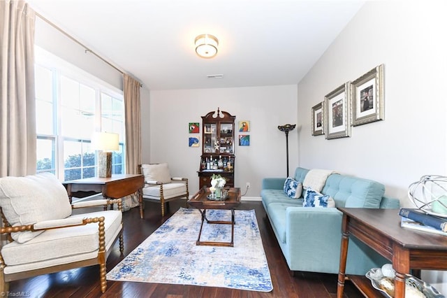 living room featuring dark hardwood / wood-style floors