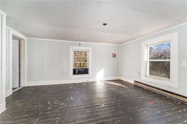 unfurnished room with dark hardwood / wood-style floors, cooling unit, and a baseboard heating unit