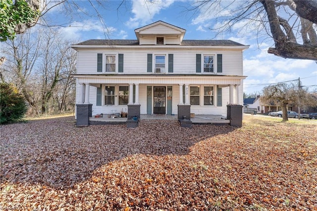 view of front of property featuring covered porch