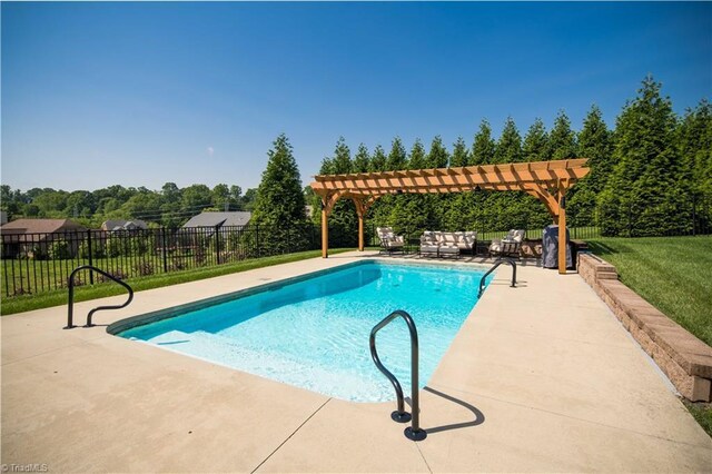 view of swimming pool featuring a pergola and a patio area
